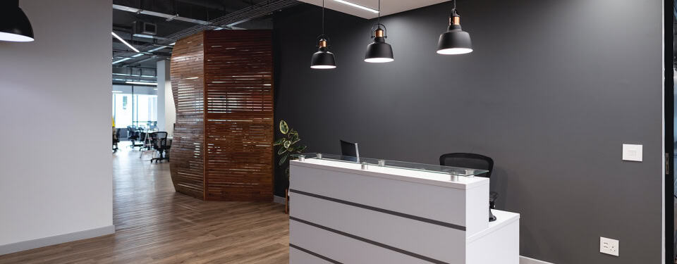 Inside of an office with a front reception desk